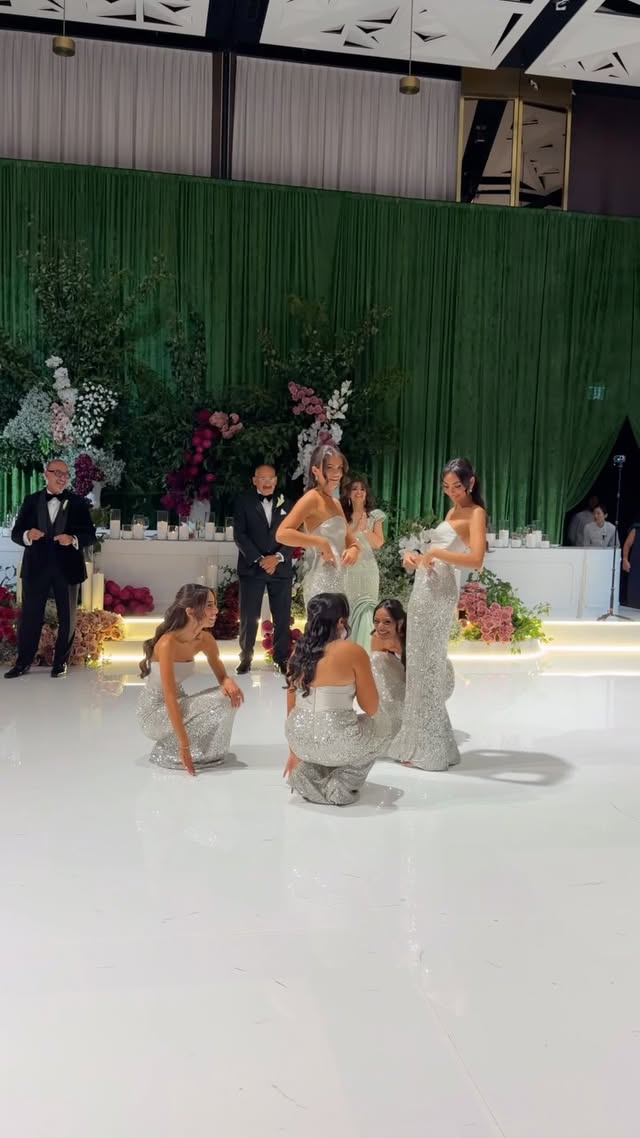 An iconic bridal party entrance on the dance floor