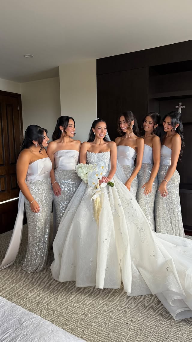 Bridesmaids seeing the bride for the first time